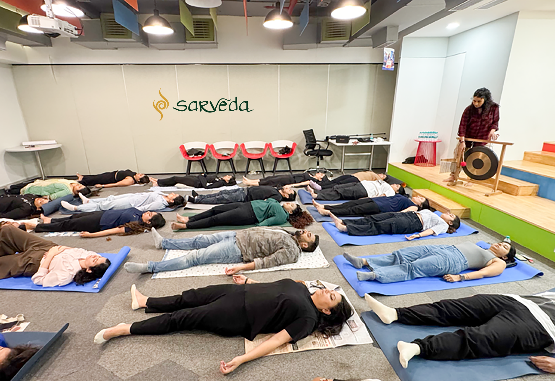 Corporate sound healing and mindfulness session with singing bowls